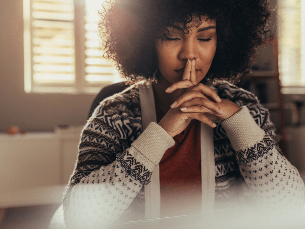 Image of a woman meditating.